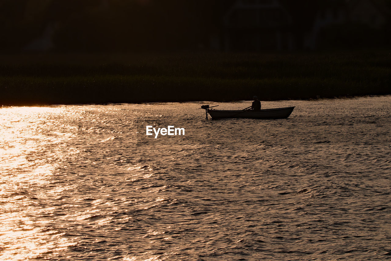 BOAT SAILING ON SEA