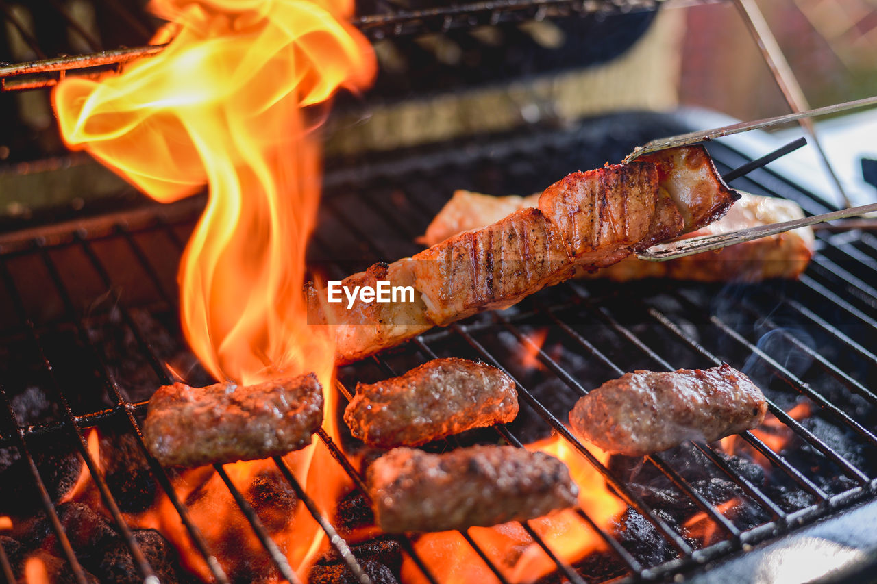 Close-up of meat on barbecue grill