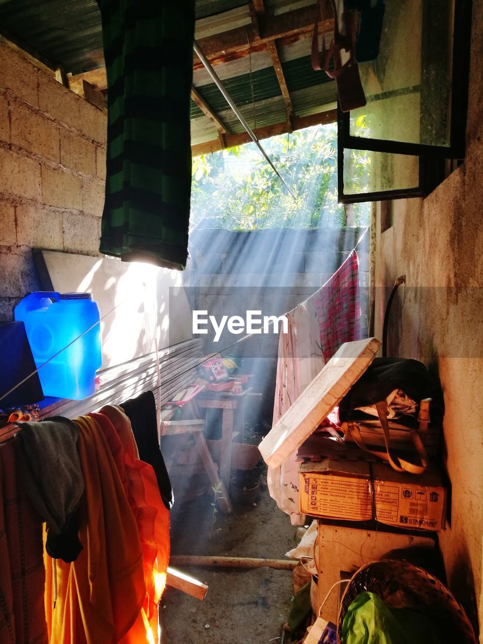 CLOTHES DRYING ON WALL BY BUILDING