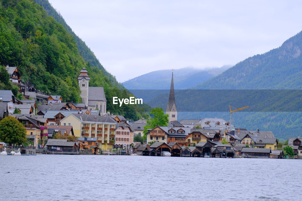 Scenic view of lake against sky at hallstat, austria