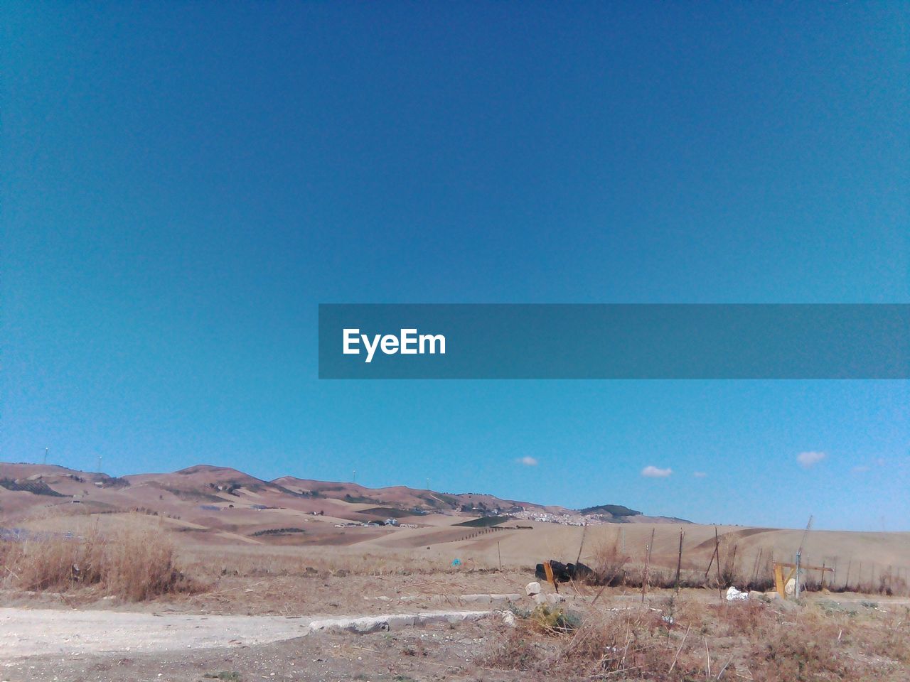 DESERT AGAINST CLEAR BLUE SKY