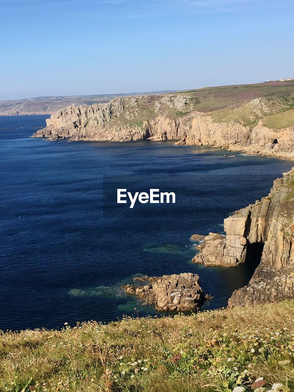 Scenic view of sea against clear sky