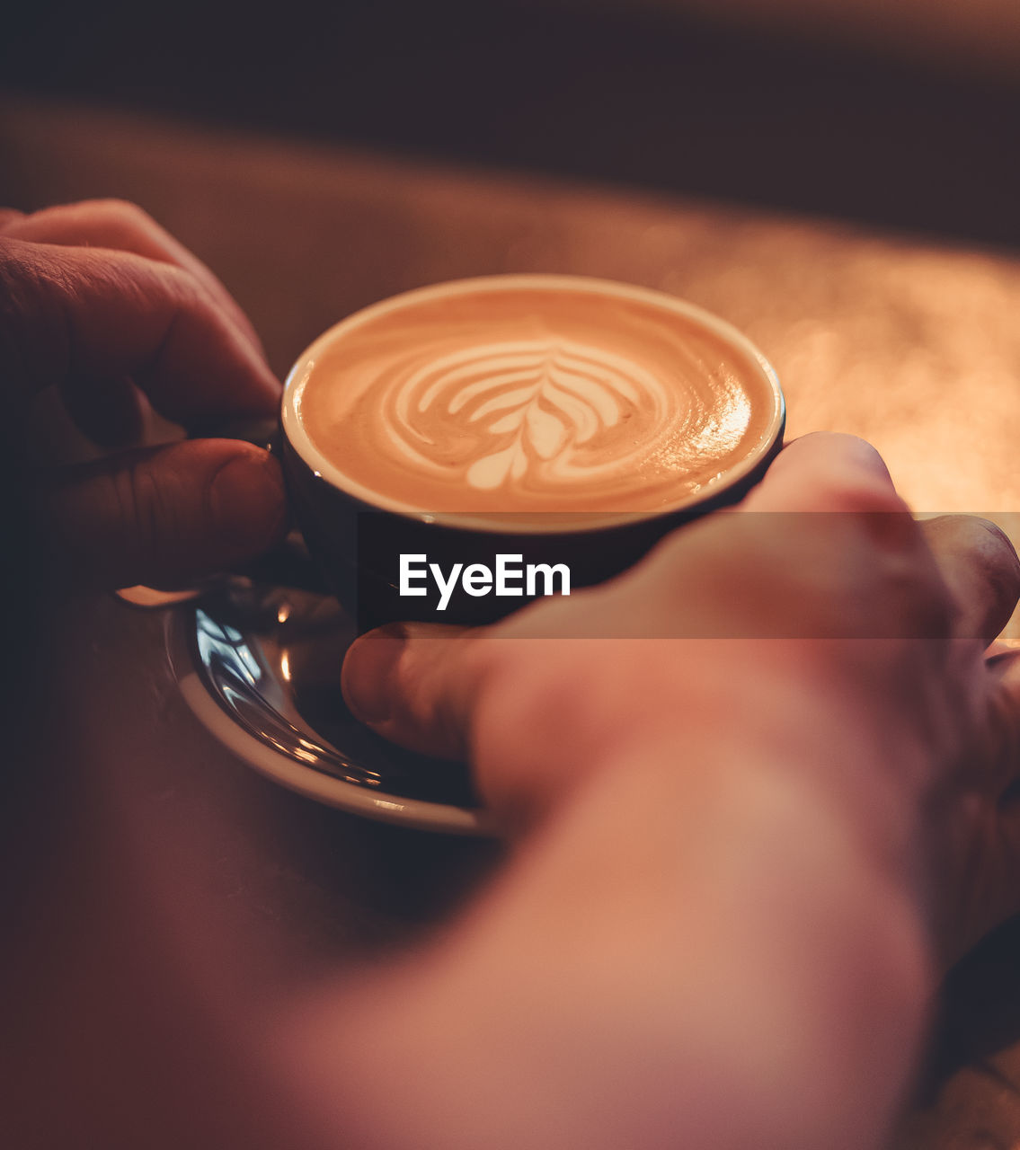 HIGH ANGLE VIEW OF COFFEE CUP WITH CAPPUCCINO