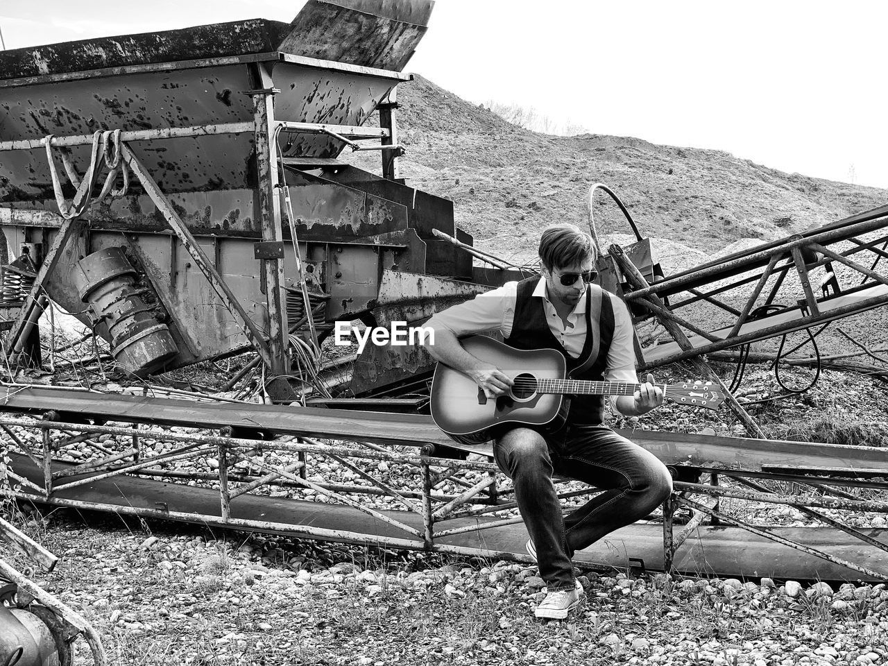 Portrait of men sitting on land, guitar, men with guitar, 