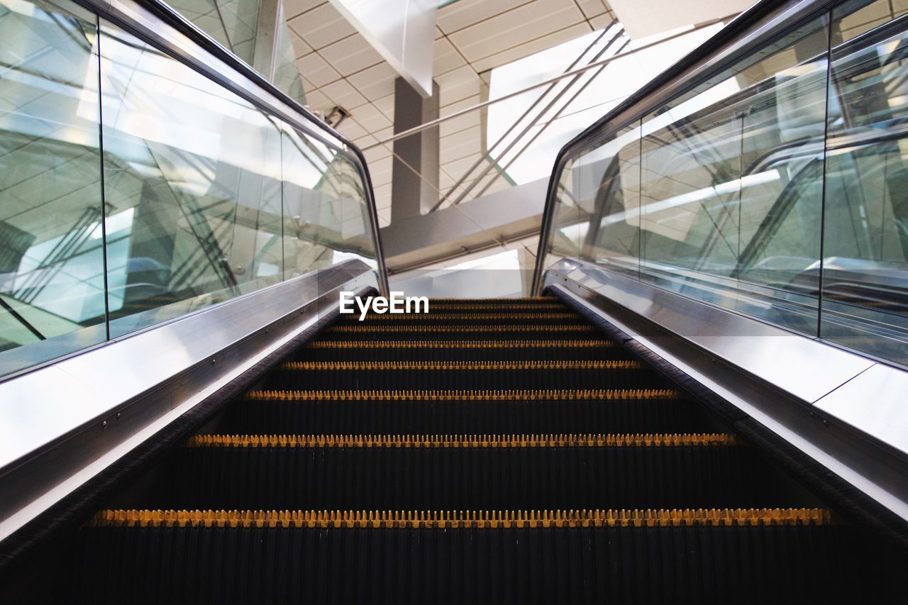 Low angle view of escalator in building