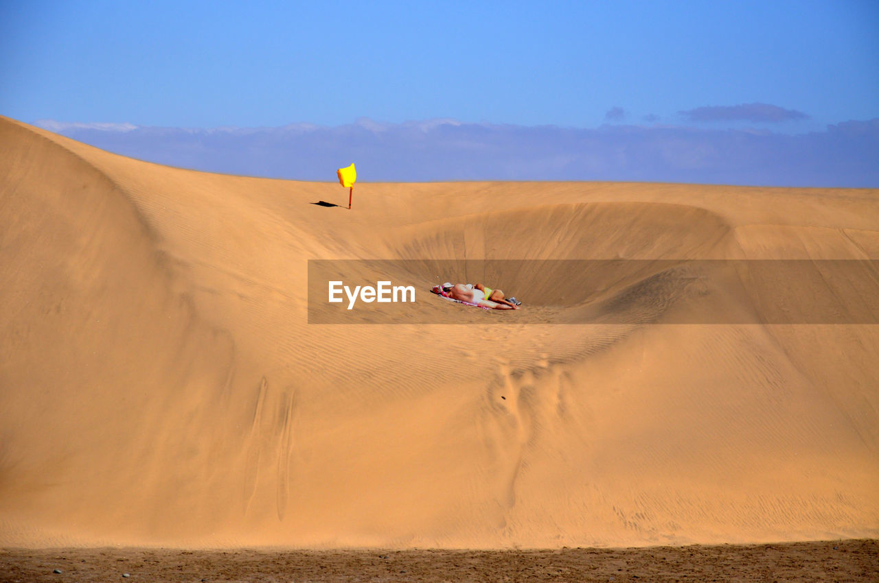 Scenic view of desert against clear sky