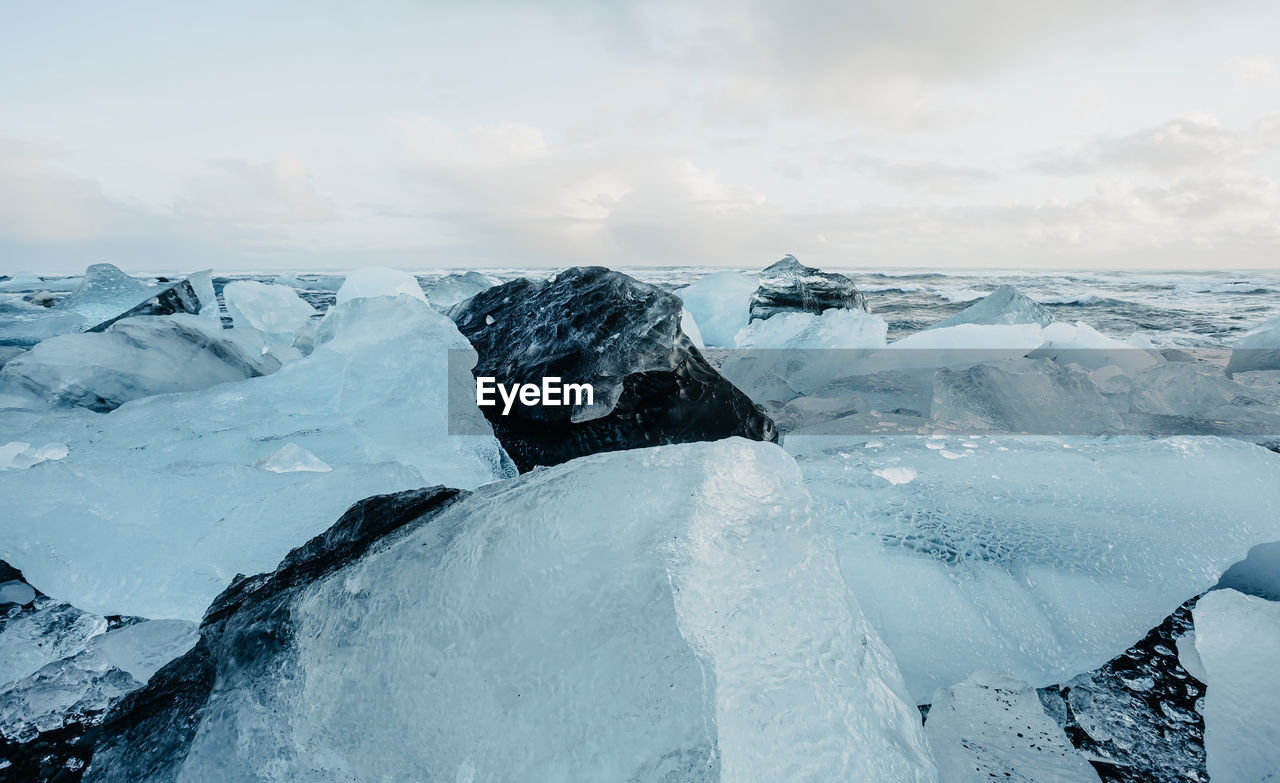 Breathtaking diamond beach on iceland in winter with large ice blocks, ice cubes