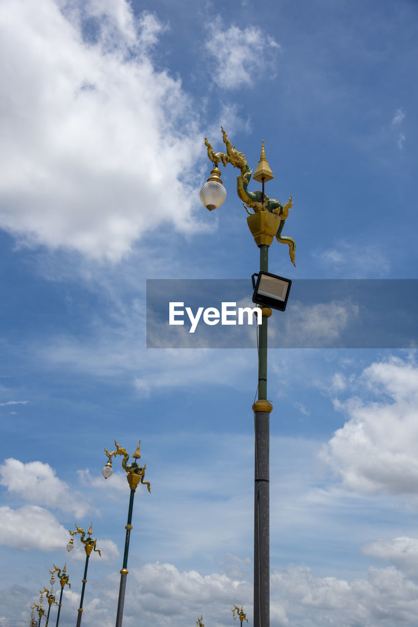 LOW ANGLE VIEW OF STREET LIGHT AGAINST BLUE SKY