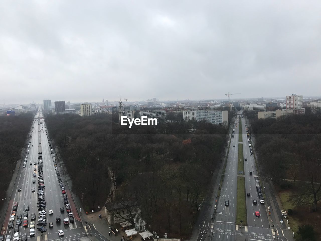 High angle view of vehicles on road against sky