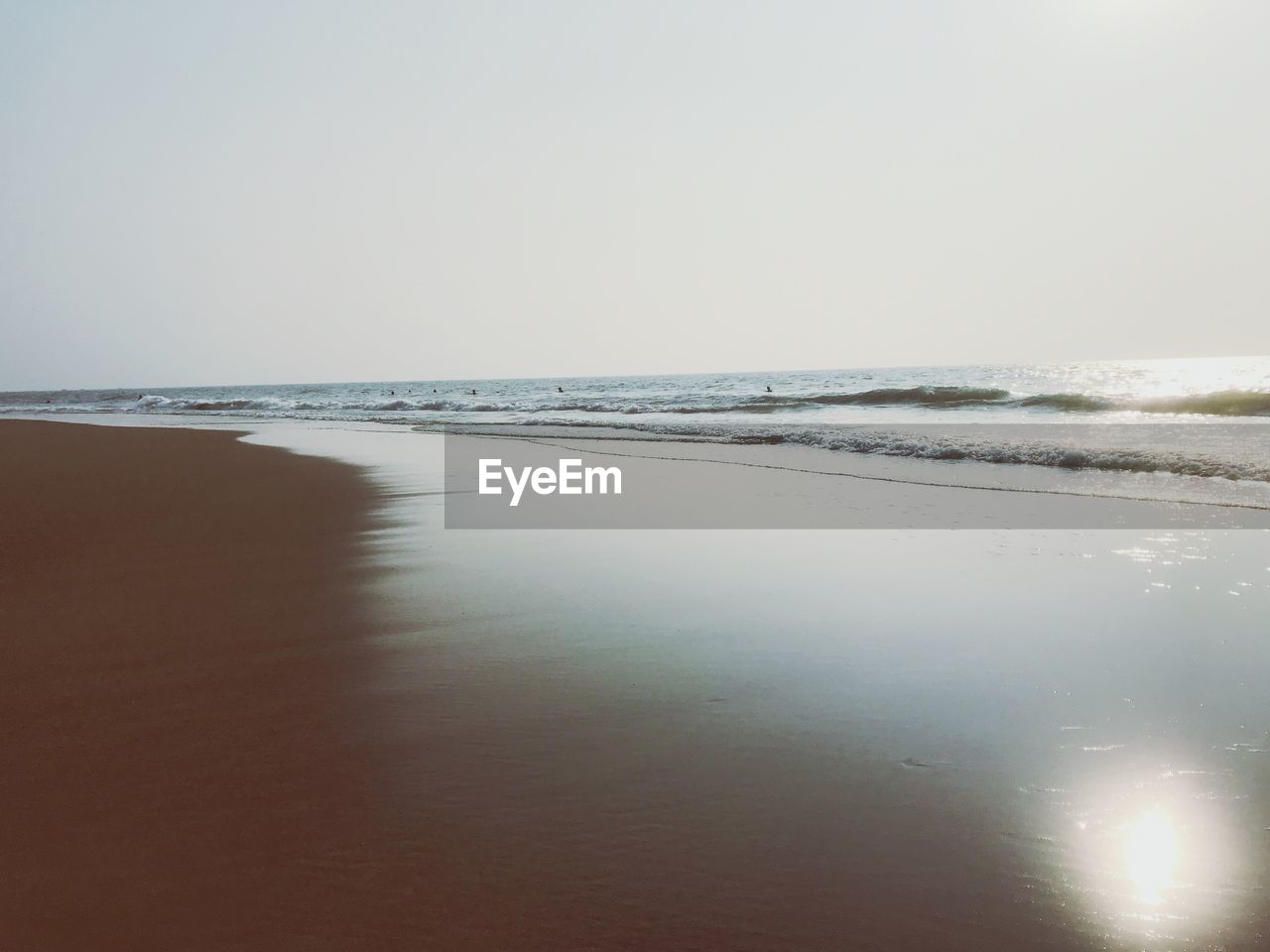 VIEW OF BEACH AGAINST CLEAR SKY