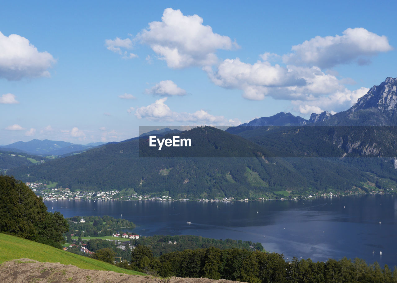 Scenic view of mountains against cloudy sky