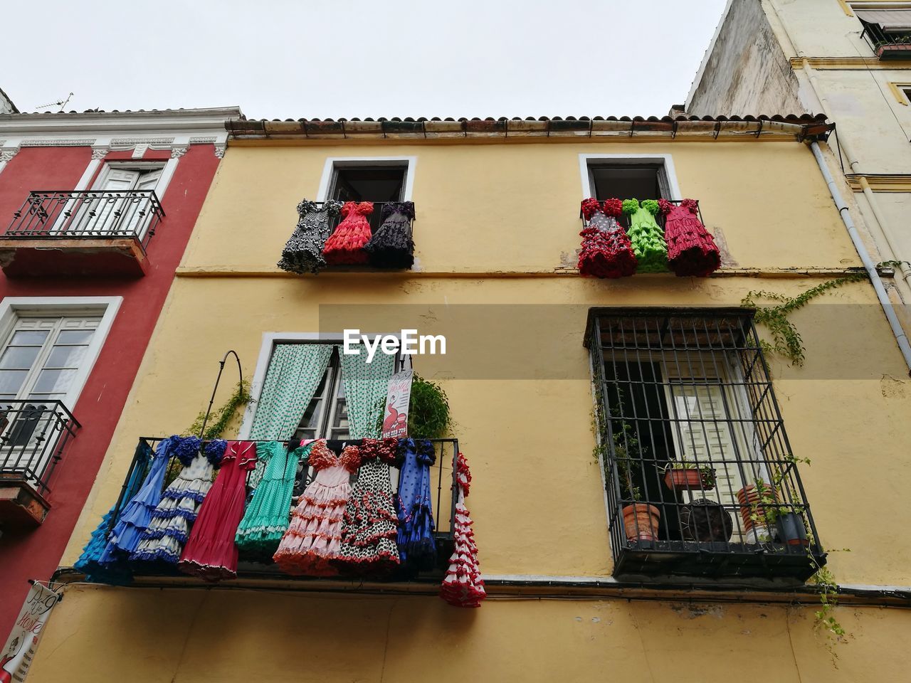 Low angle view of clothes drying in balcony