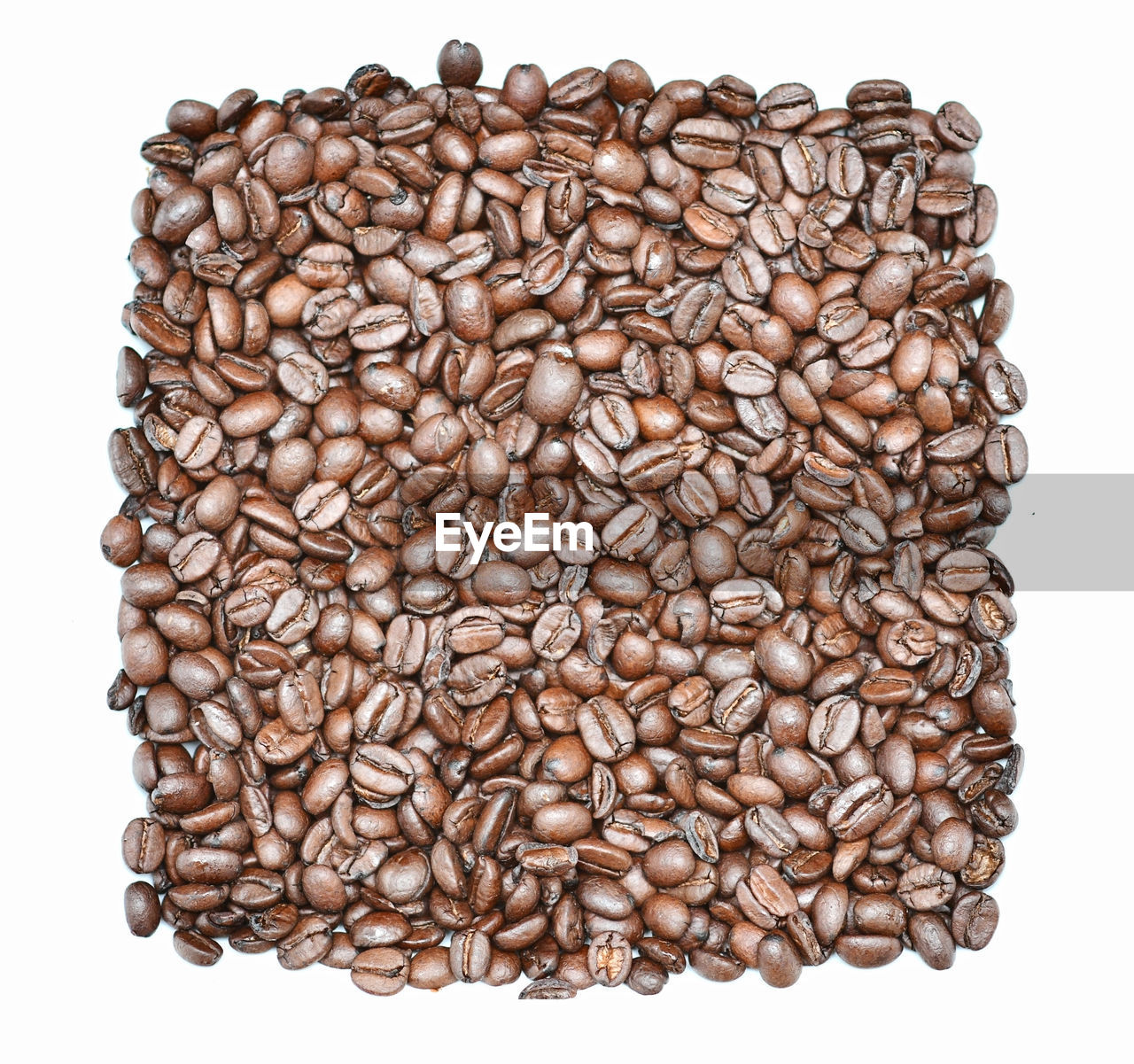 Roasted coffee beans background or wallpaper. a stimulant contains caffeine and is a tasty drink