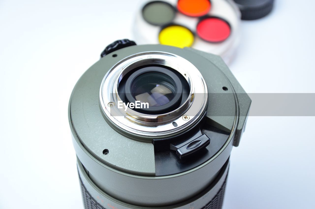 Close-up of camera on white background