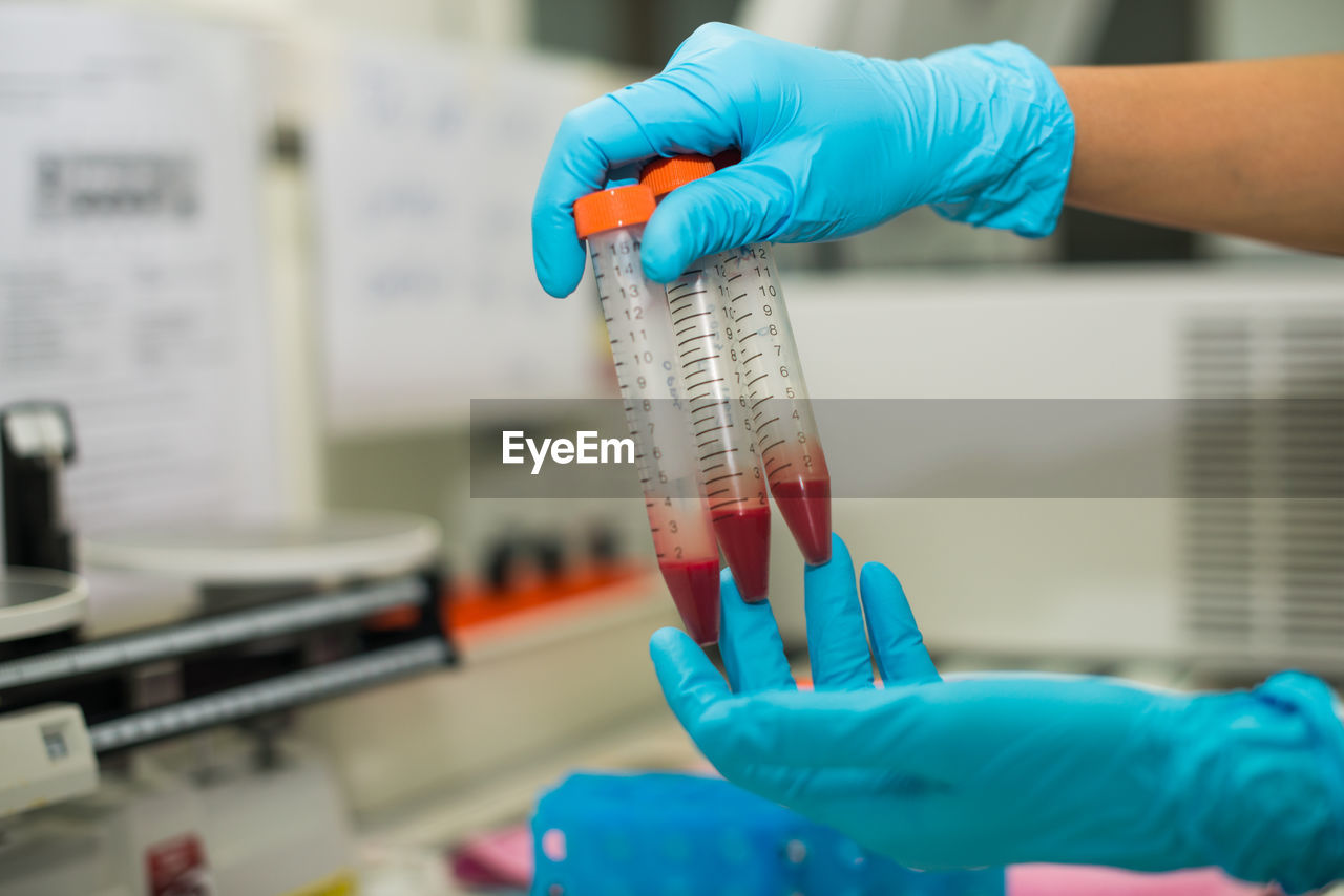 Cropped hands of scientist experimenting in laboratory