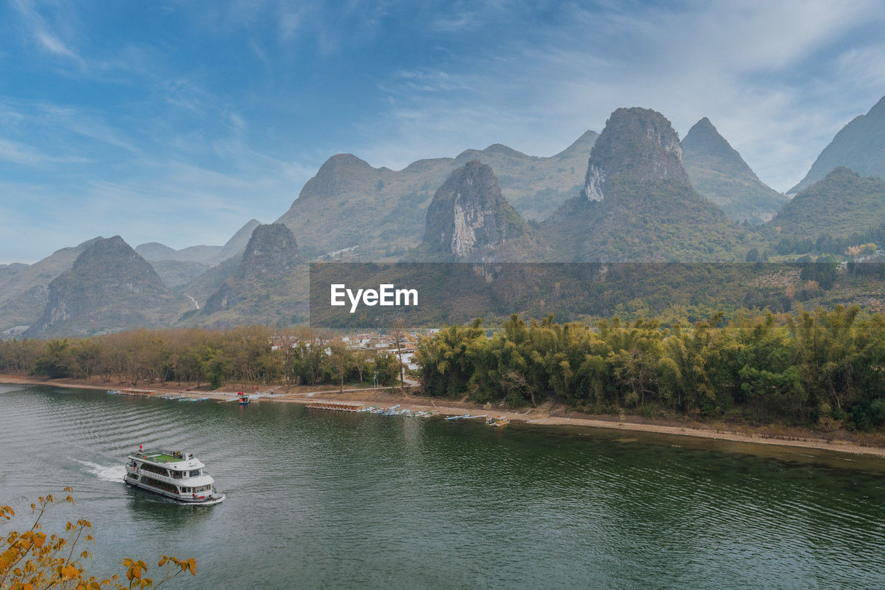 scenic view of lake against mountain