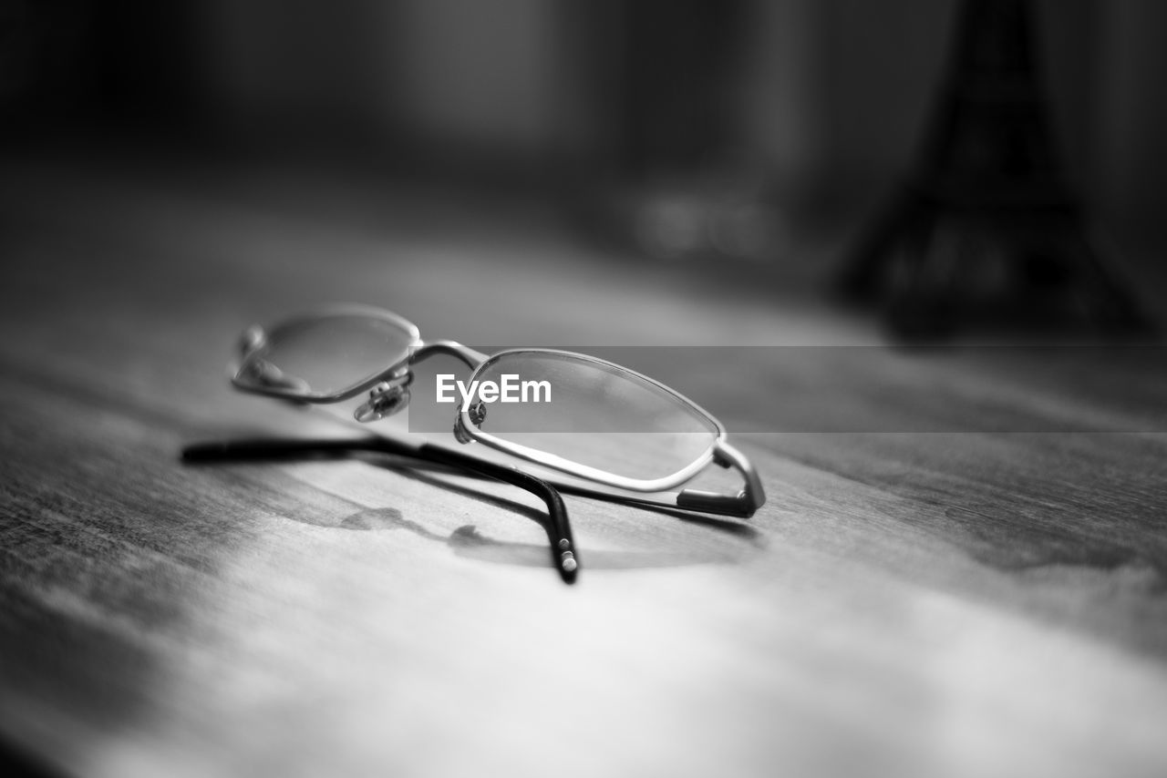 Close-up of eyeglasses on table