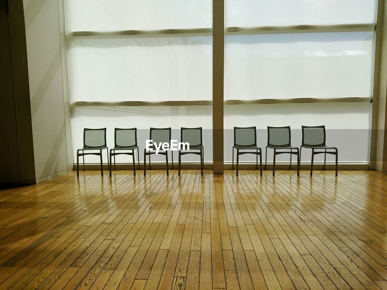 CLOSE-UP OF EMPTY CHAIRS