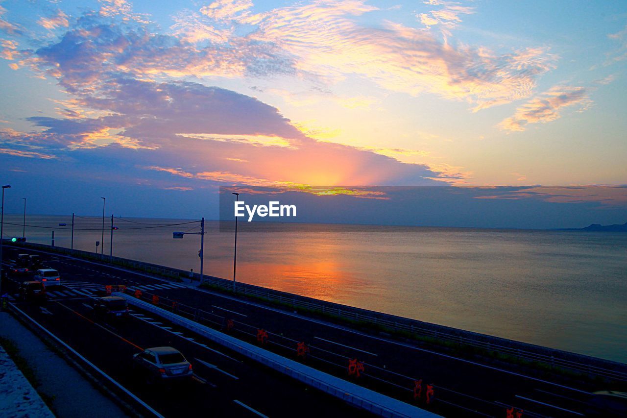 Scenic view of sea at sunset