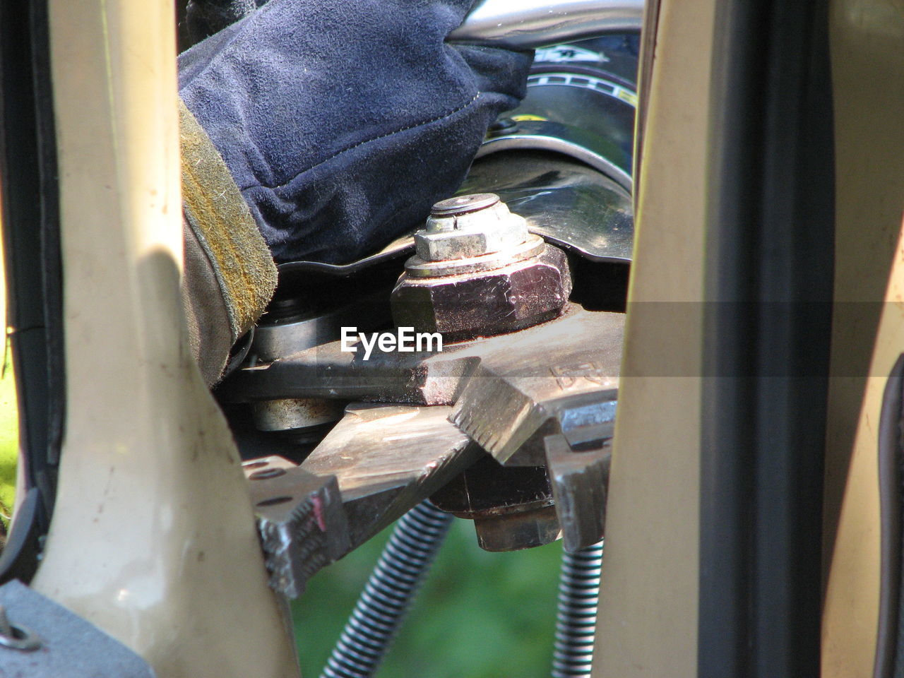 LOW SECTION OF MAN WORKING AT BUS