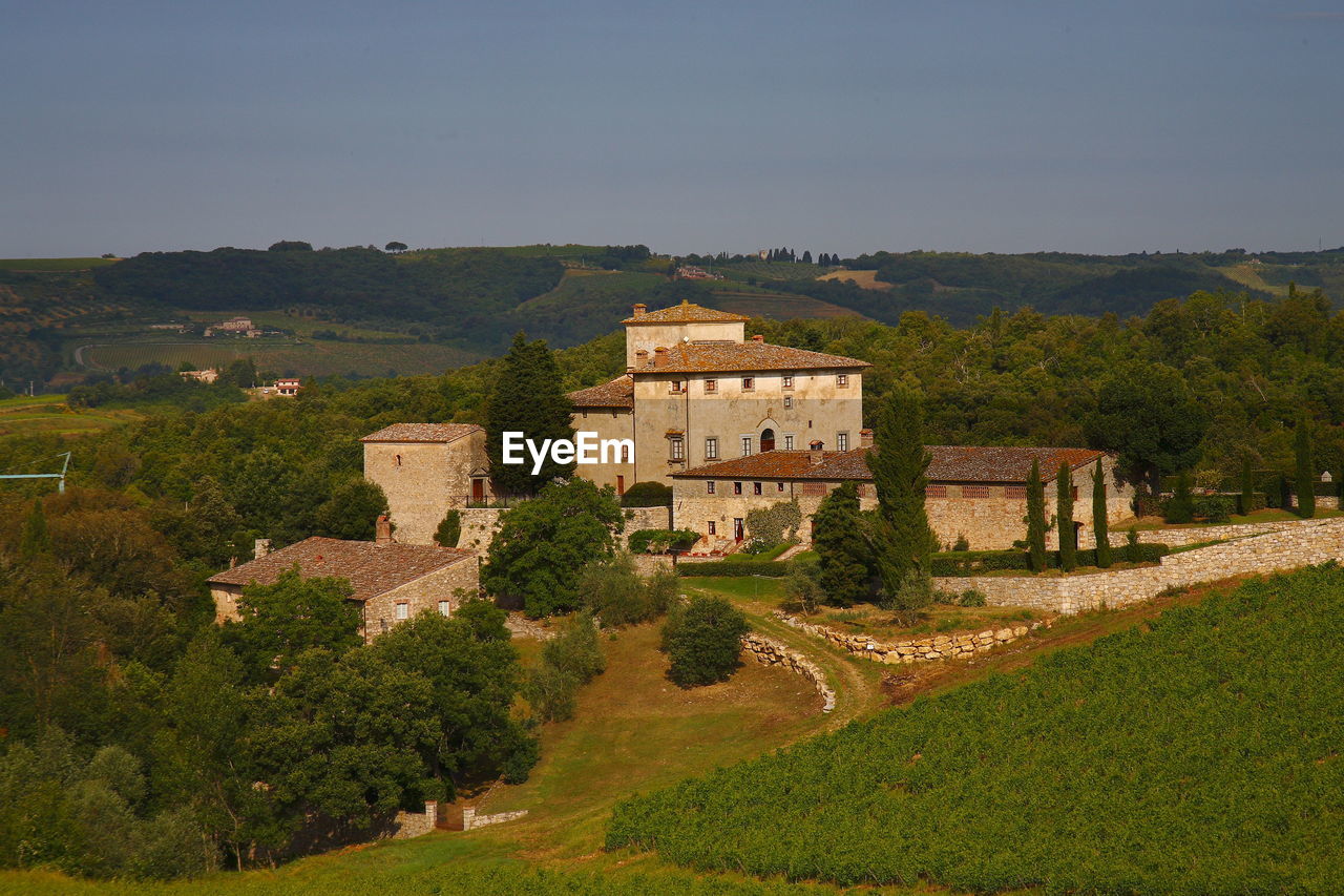 Panoramic view of castle and buildings against sky