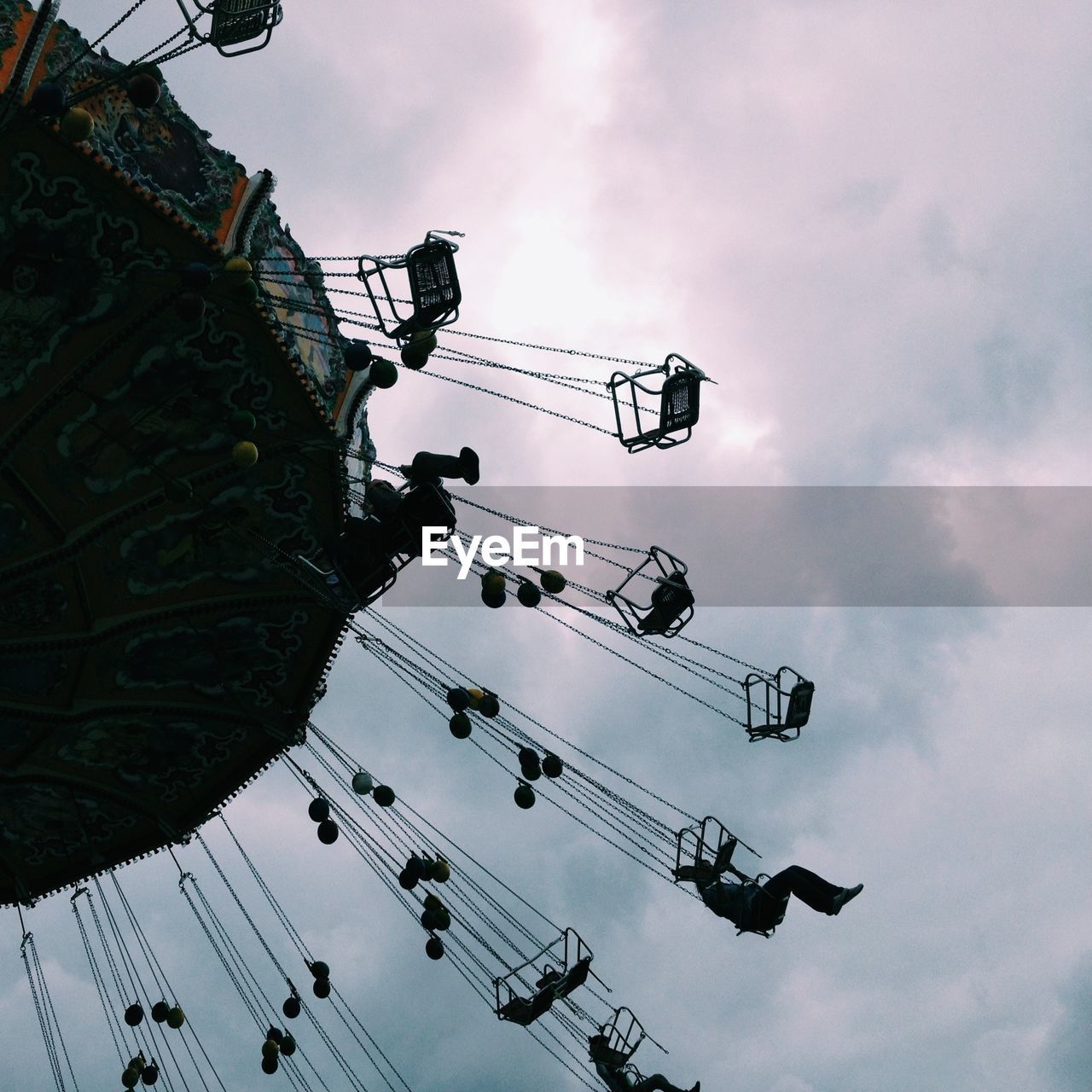 LOW ANGLE VIEW OF ROLLERCOASTER AGAINST SKY