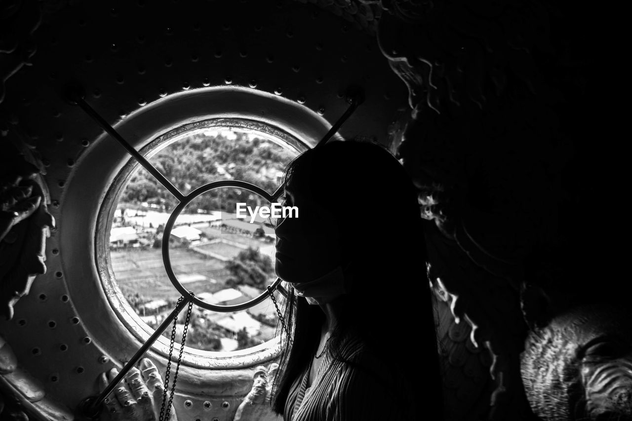 CLOSE-UP PORTRAIT OF SILHOUETTE WOMAN STANDING BY CAR