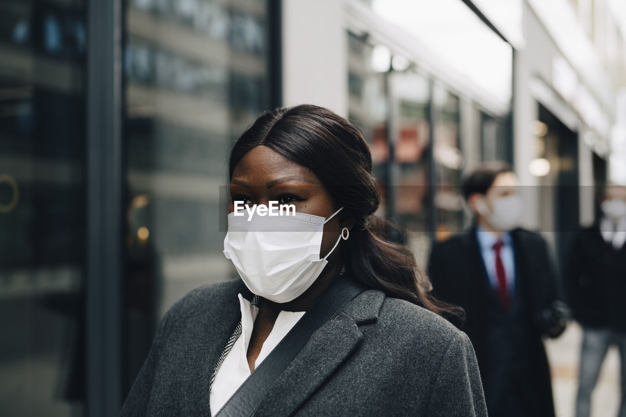 Female entrepreneur looking away during pandemic