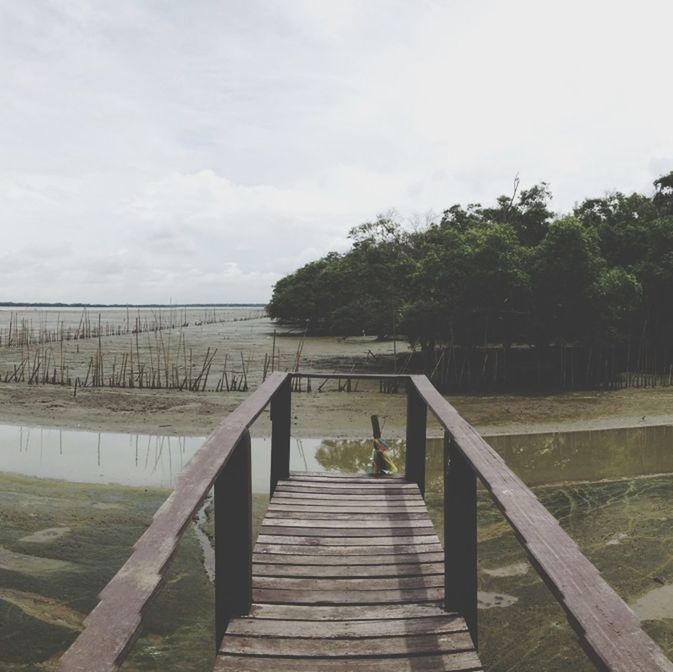 Observation point by river against sky