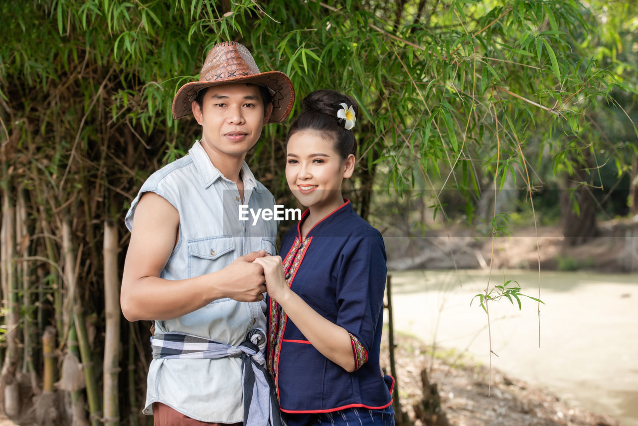 Pre wedding shoot inside garden in thai traditional dress costumes