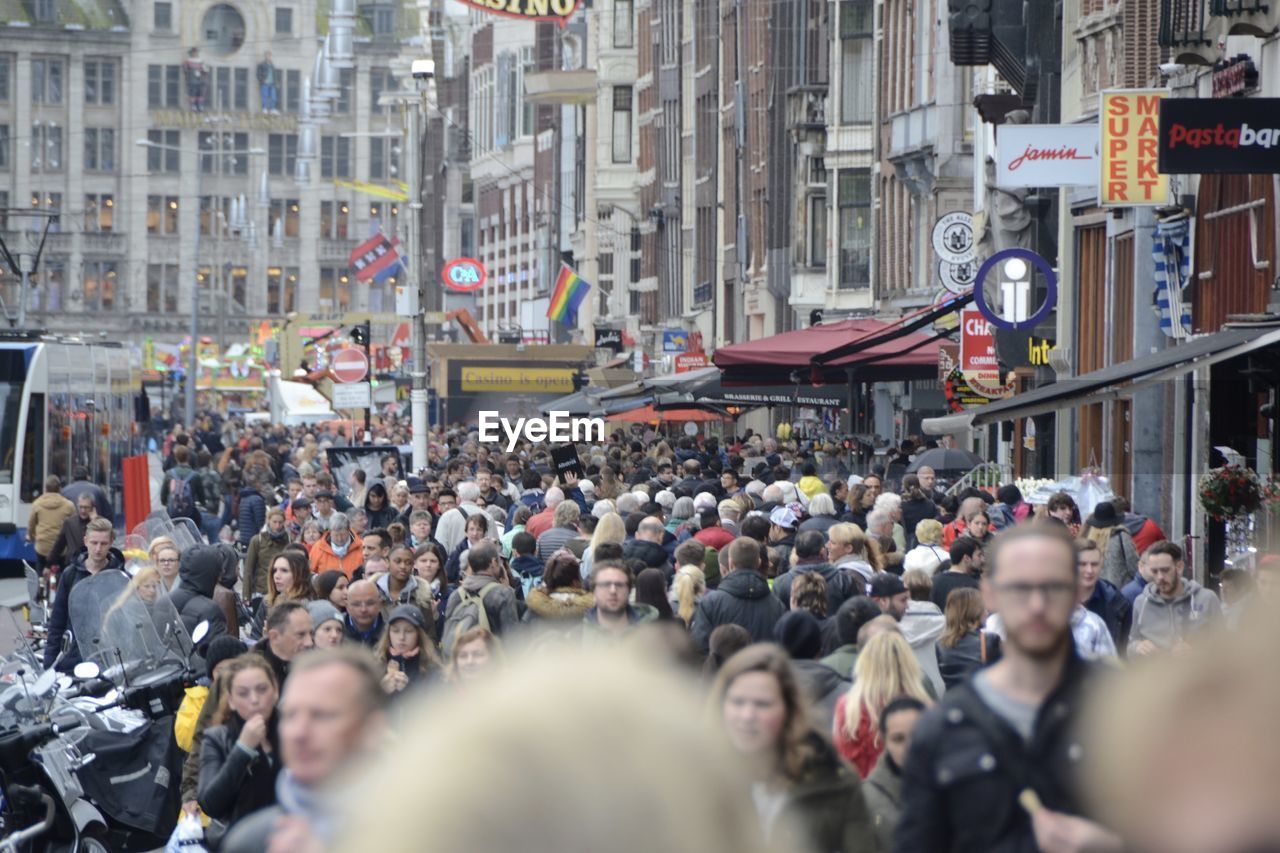 People on street in city