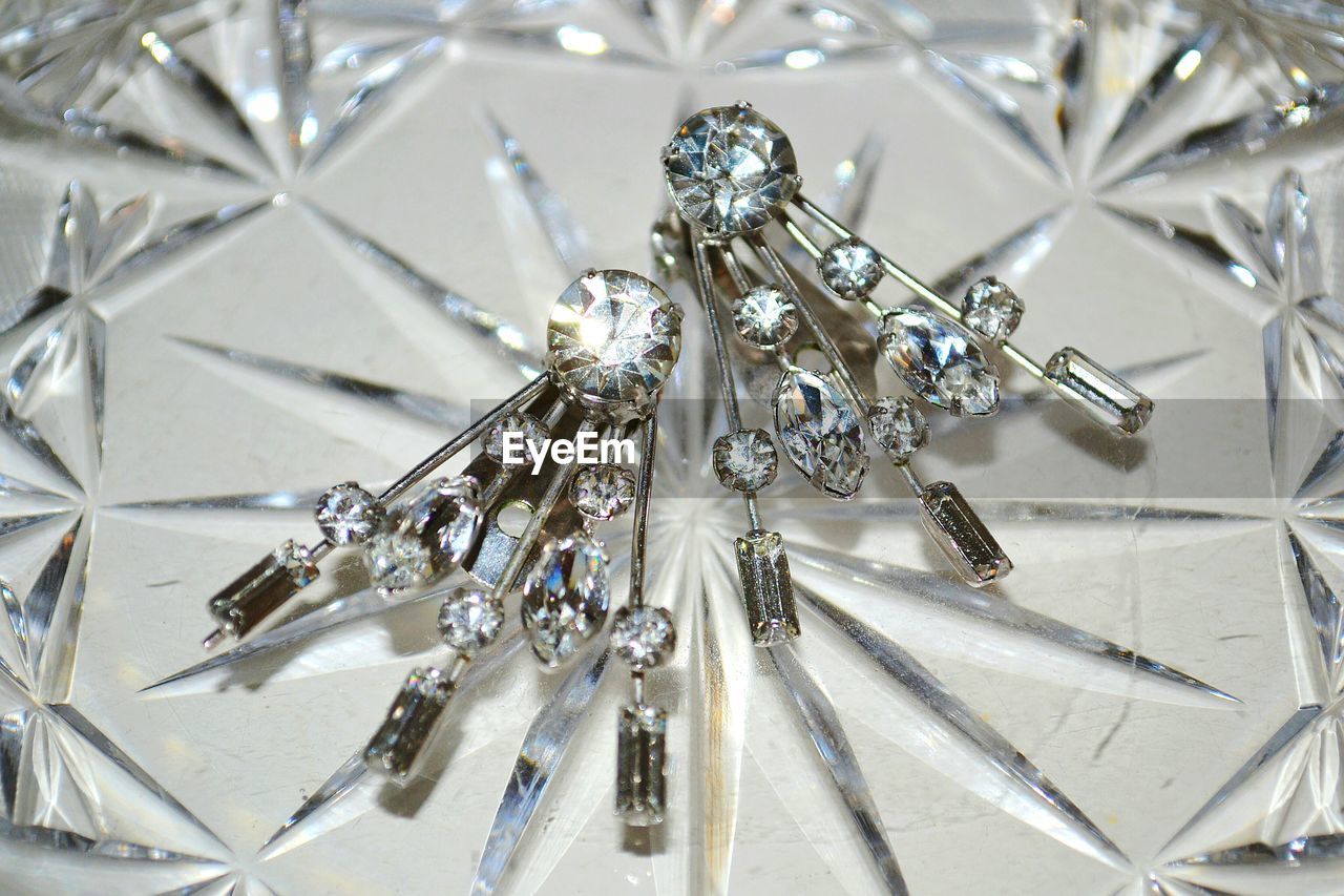 Close-up of crystal brooch pins