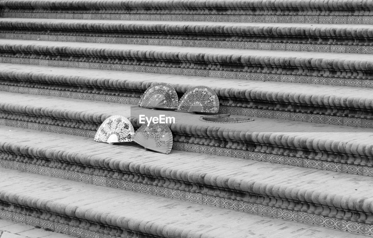 Hand fans on steps