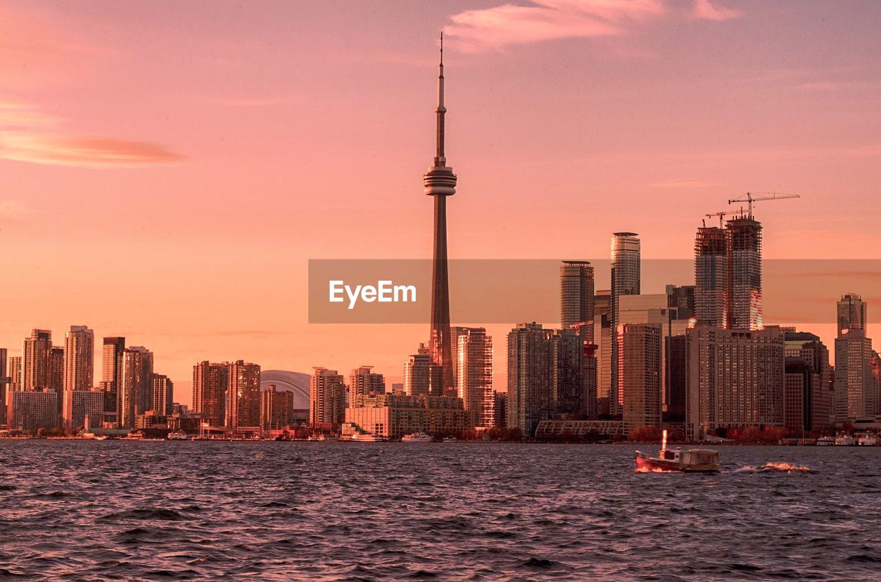 View of skyscrapers at sunset