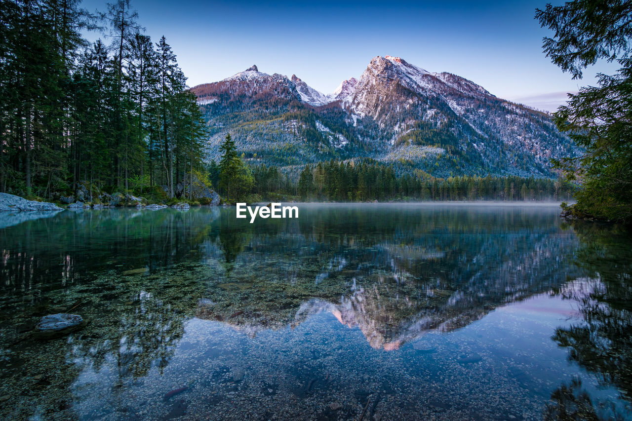 Dawn at the mountain lake hintersee in the alps of bavaria