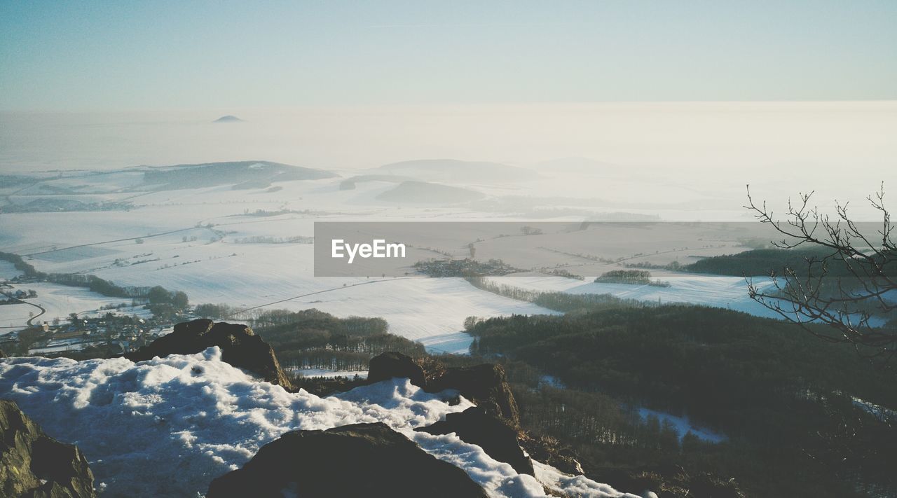 Scenic view of snow mountains against sky