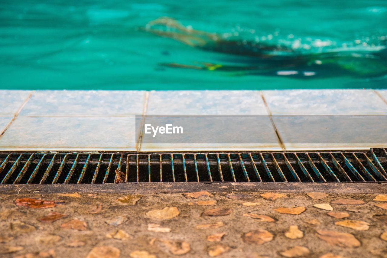 High angle view of swimming pool by lake