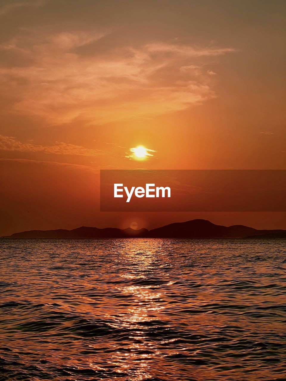 scenic view of sea against romantic sky during sunset