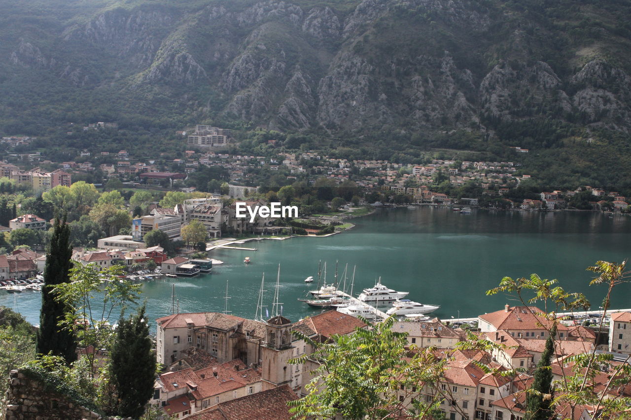 High angle view of townscape by river