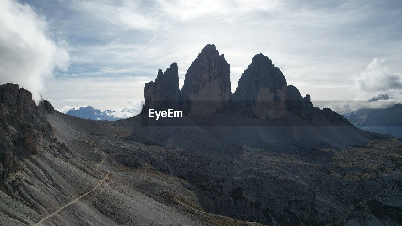 panoramic view of rock formations against sky