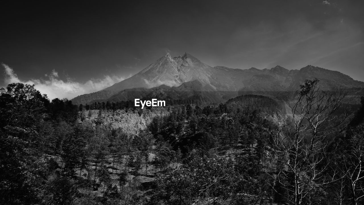 Merapi mountain in indonesia. mountain againts the sky in black and white photograph