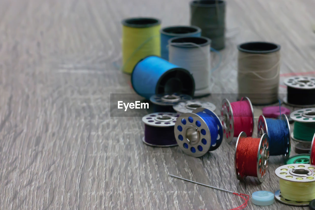 Close-up of sewing kit on table