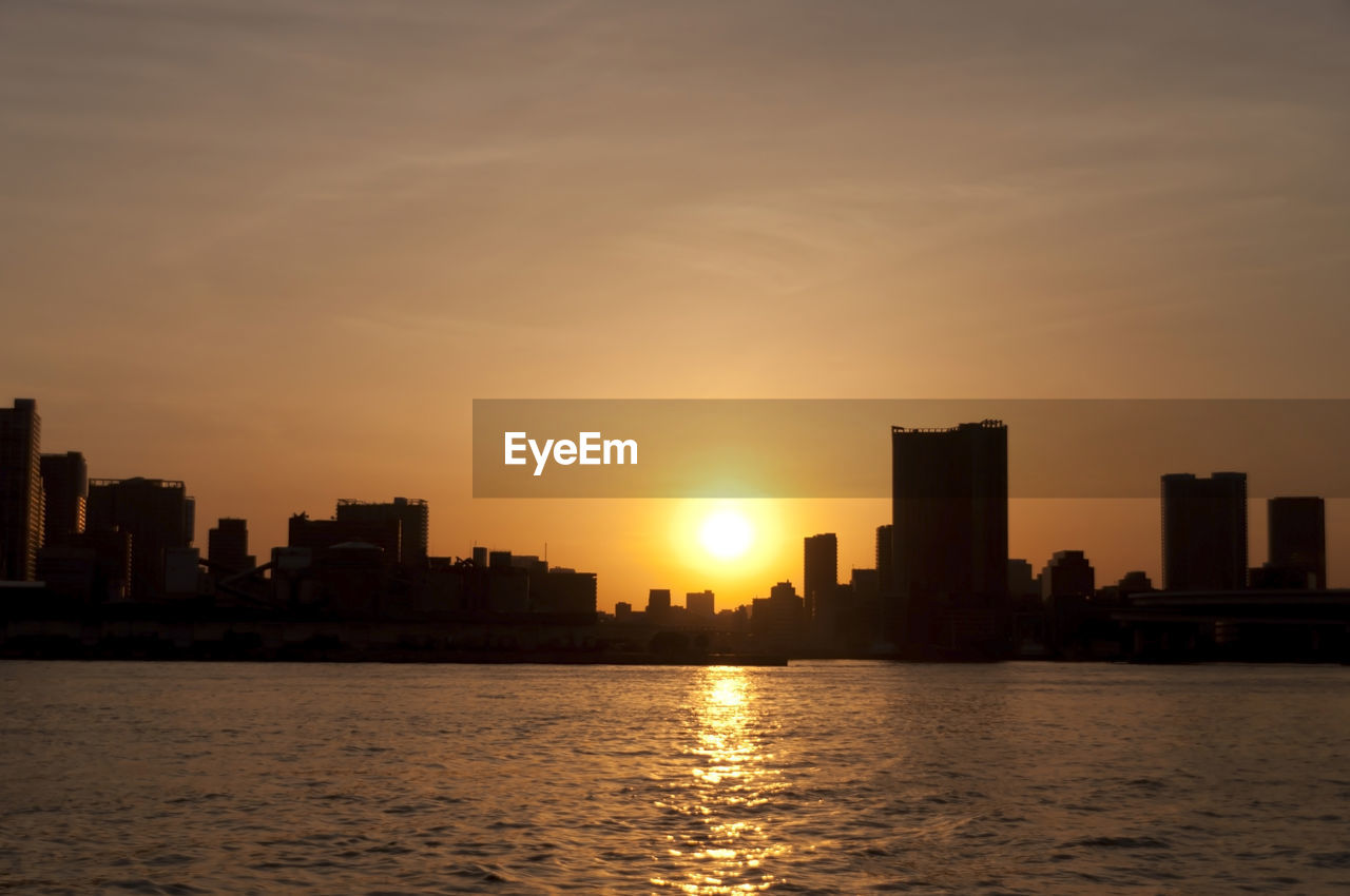 Silhouette of buildings at sunset