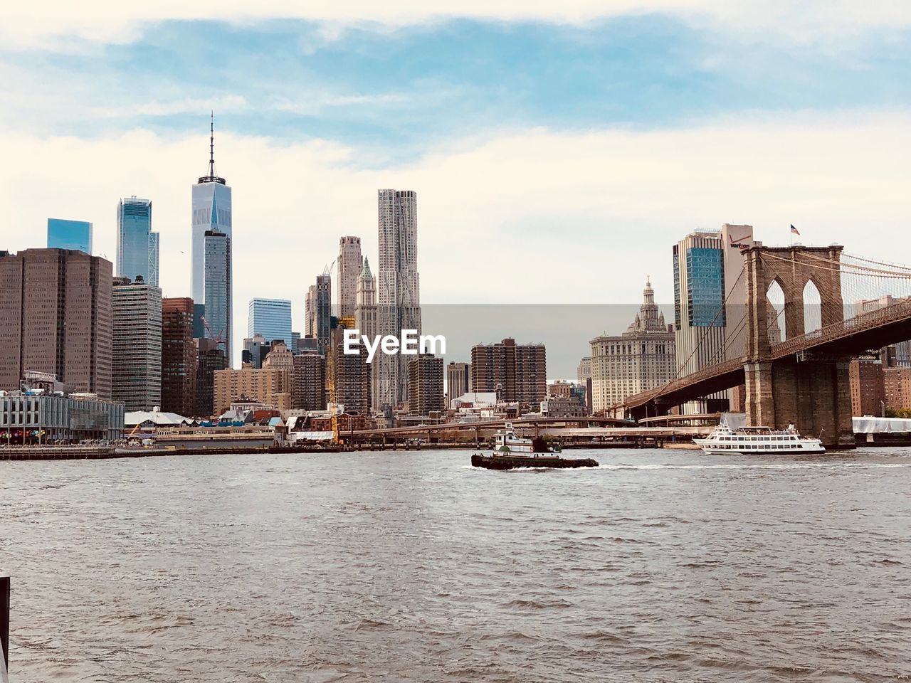 View of buildings in city at waterfront