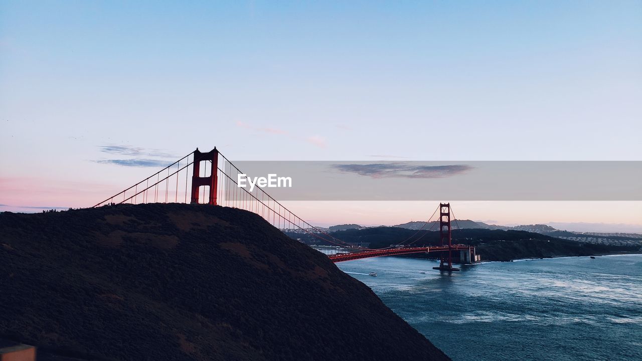 VIEW OF SUSPENSION BRIDGE IN SEA