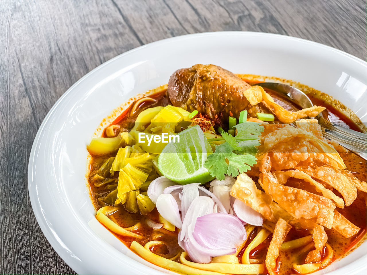 High angle view of meal served on table khao soi 
