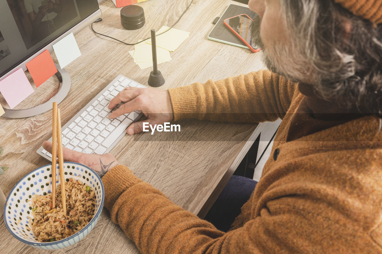 Employee eating in the office