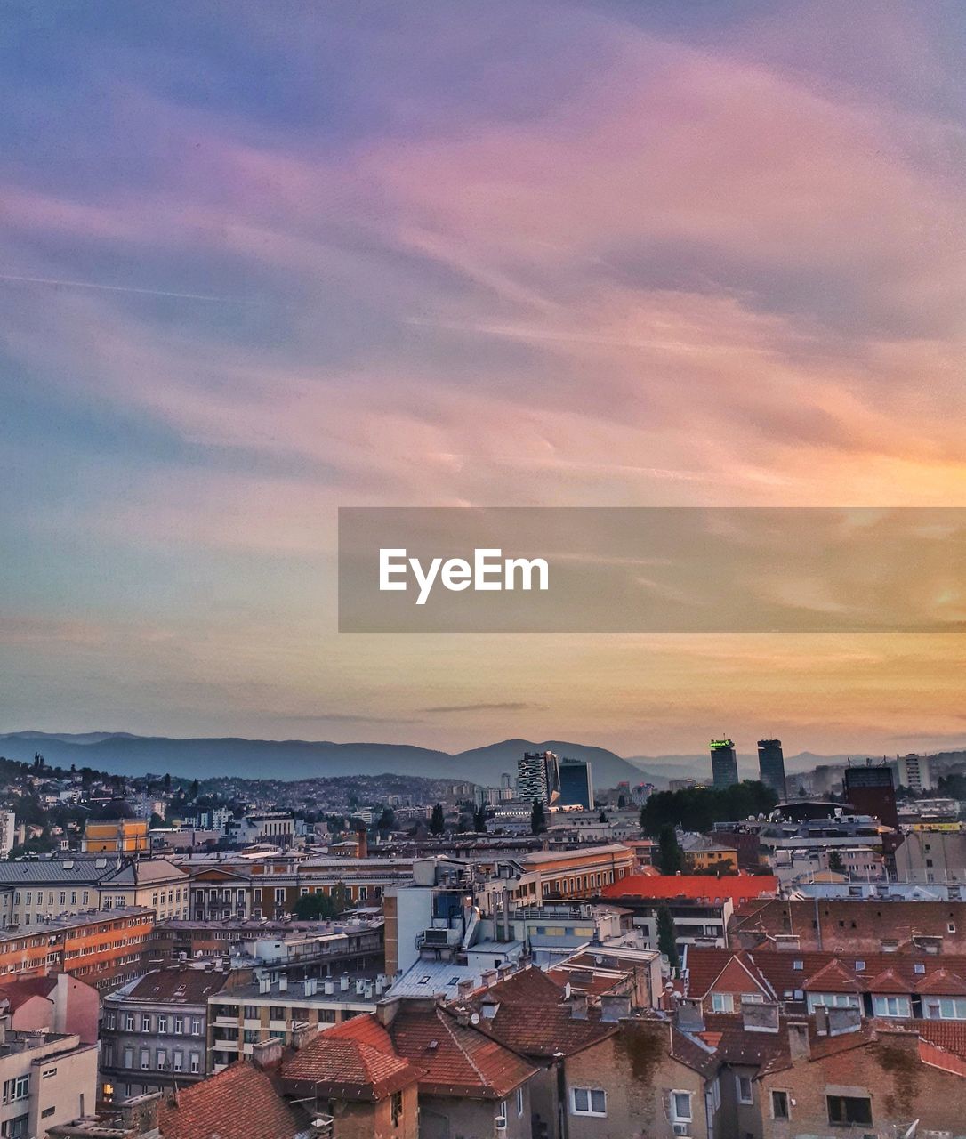 High angle view of townscape against sky at sunset