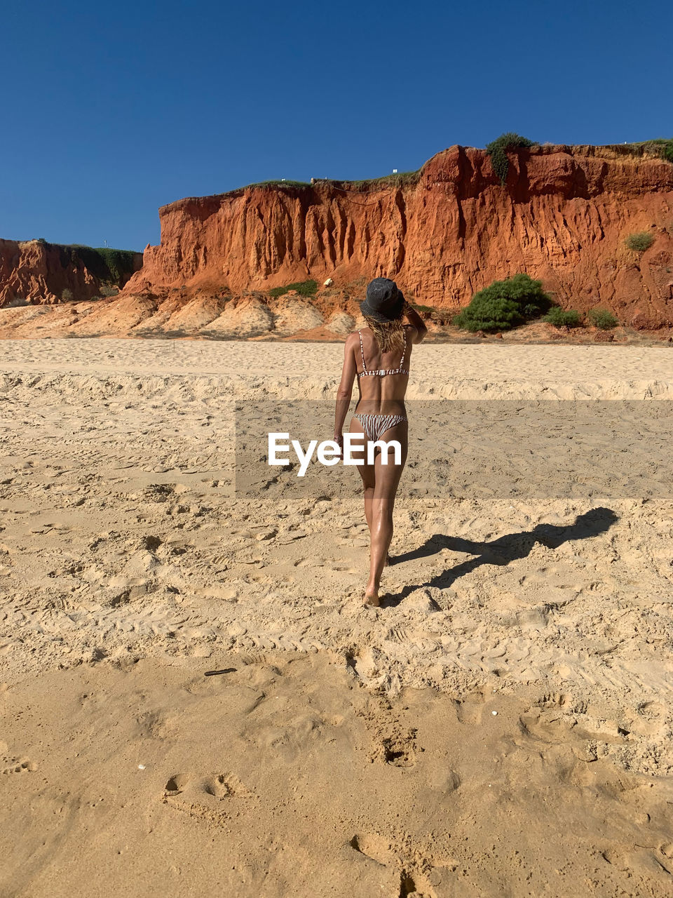 Full length of woman on rock