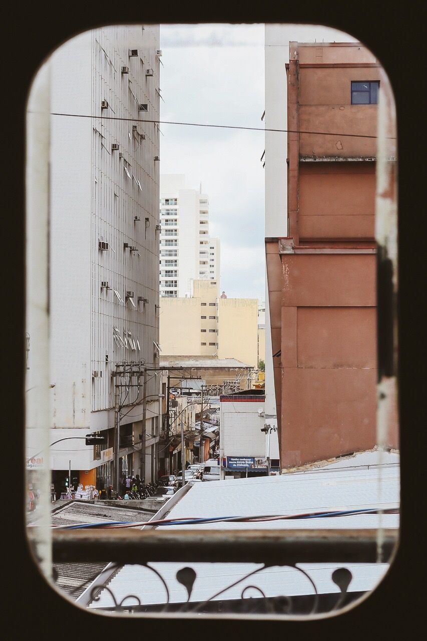 View of buildings along street seen from window